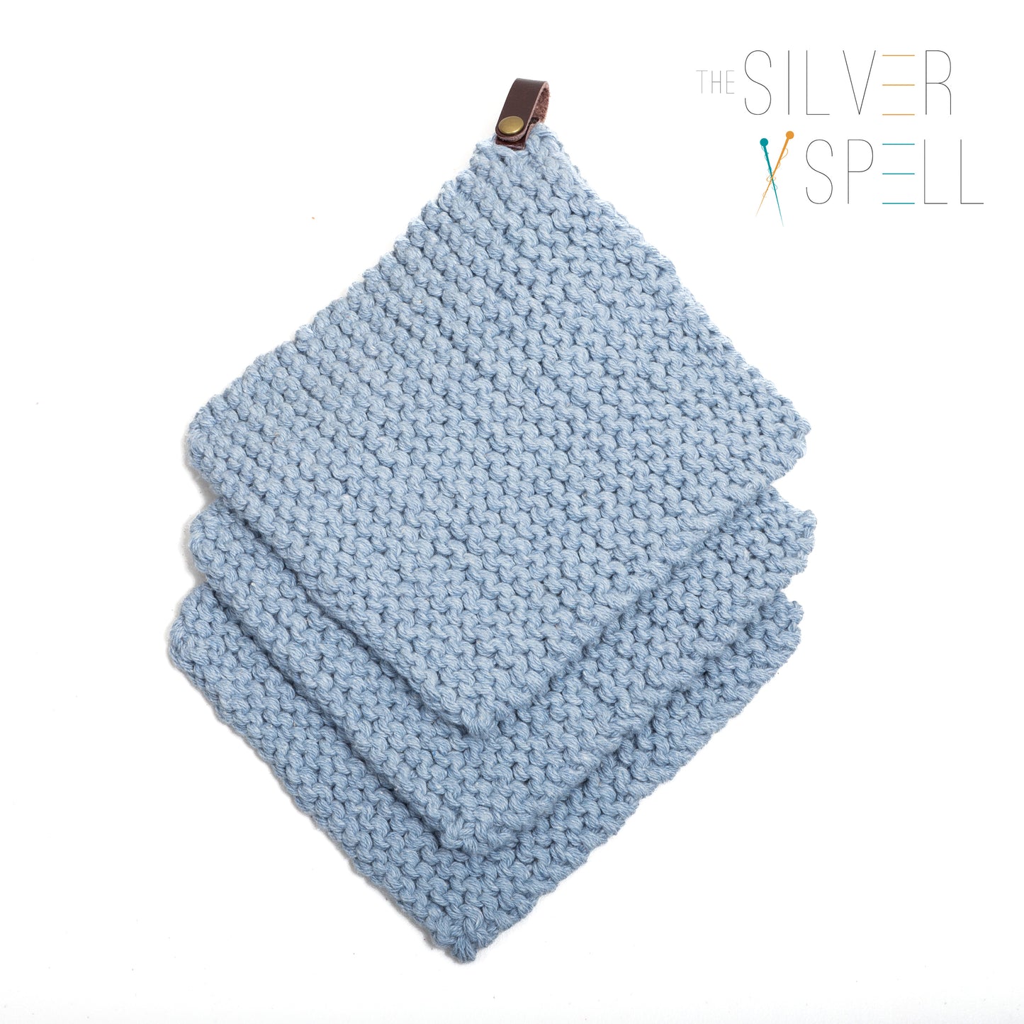 Three towels in blue stocked on top of each other